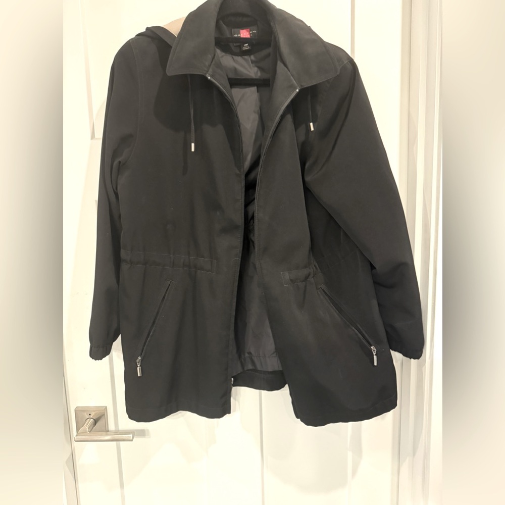 Black women’s jacket with removable hood.